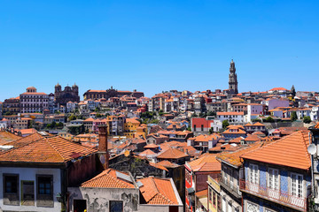 Naklejka na ściany i meble Towers and churches over the orange rooftops of Porto, Portugal