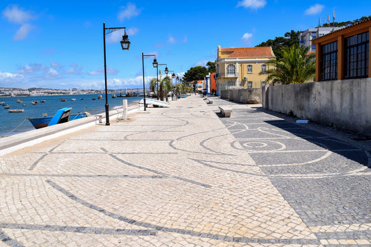 Waterfront promenade in Trafaria along the Tagus River opposite Lisbon, Portugal