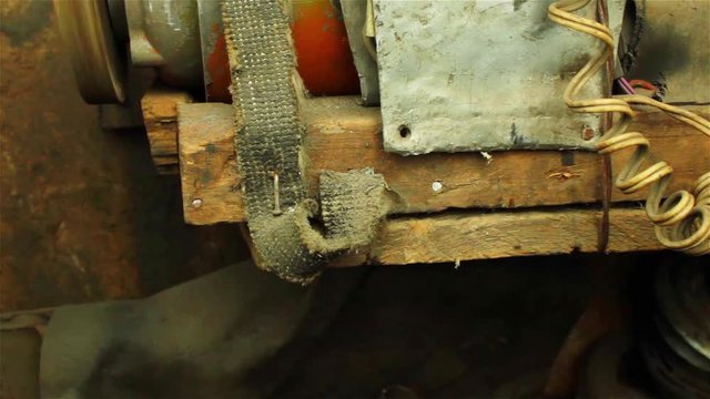 Old rusty grinding whetstone