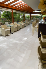 Bar with stools and tables