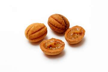 homemade cookies, nuts with condensed milk on white background