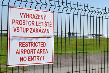Sign with the name, Restricted airport area no entry.