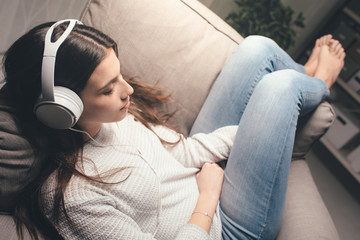 Girl listening to relaxing music