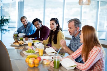 Creative business team having meal