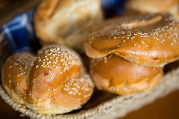 Close-up of croissants in wicker basket at counter
