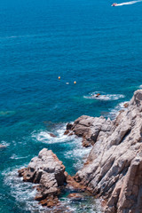 The Summer Blue sea with the rock