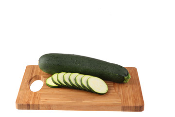 Fresh vegetables and fruits on the shredder