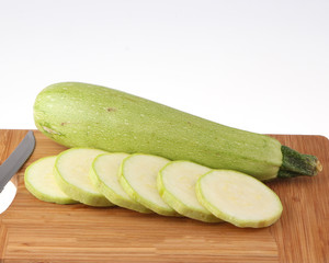 Fresh vegetables and fruits on the shredder