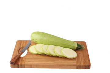 Fresh vegetables and fruits on the shredder