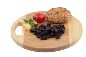 Fresh vegetables and fruits on the shredder