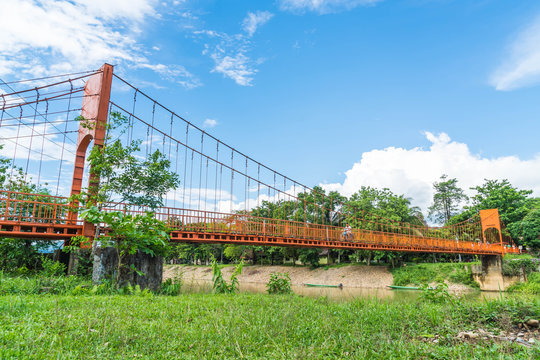 Orange bridge cross the river at Jung cave in Vang Vieng,