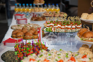 Design of a buffet table. Snacks.Variety of food