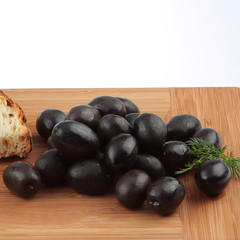 Fresh olives on the shredder