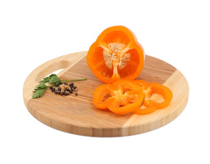 Fresh yellow pepper on the shredder