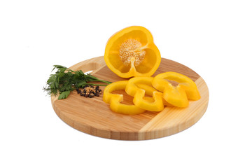 Fresh yellow pepper on the shredder