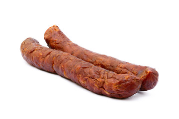 Tasty high quality smoked sausage isolated on white background