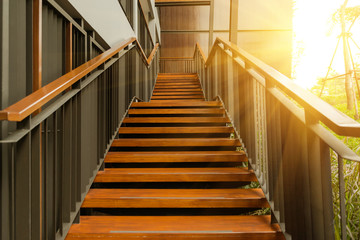 outdoor wood stair with sunlight.