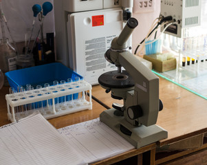 KIEV, UKRAINE, MARCN, 2017:  Light microscope standing on the table in a medical laboratory
