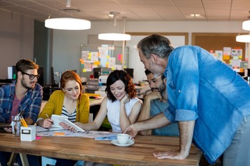 Creative business team having a meeting at desk