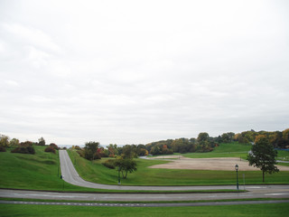 Fototapeta na wymiar Green lawn, city park, autumn, Quebec, Canada