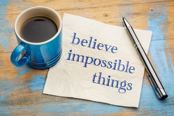 Believe impossible things text on napkin