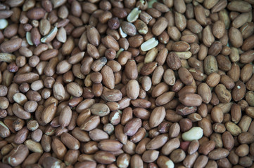 Stack of raw peanuts, the crop of Arachis hypogaea legume plant, in traditional markets know locally as souks, at medina, Marrakesh, Morocco