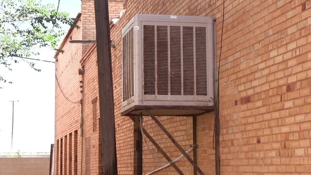 Air conditioner supplying cool air for apartment complex.
