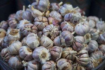 Pile of fresh garlic in the herbal shop, found all over the traditional markets know locally as souks, at medina, Marrakesh, Morocco
