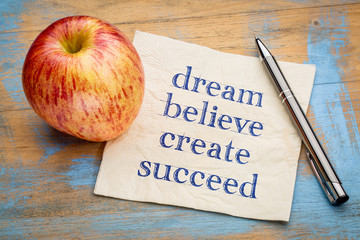 dream, believe, create, succeed - napkin concept
