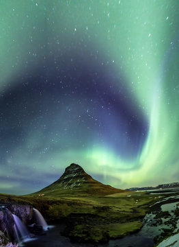 Northern Light Aurora borealis at Kirkjufell Iceland with fully start in the sky
