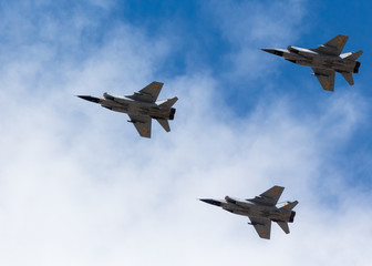 War planes in blue sky with clouds at the victory parade in the capital of Kazakhstan Astana in 2017