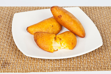 Tasty empanadas stuffed with cheese and tender corn