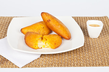 Tasty empanadas stuffed with cheese and tender corn