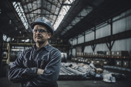 Portrait of male worker standing in metal industry