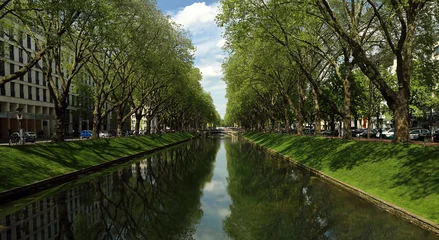 Wall murals Channel Panorama summer bright view of the historic trade avenue Koenigsallee (King's Avenue) Germany with canal in the middle, Dusseldorf, Germany