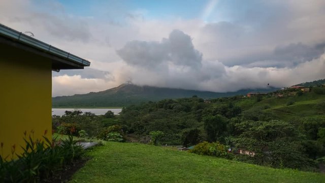 Time lapse of the volcano of Arenal covered in clouds during sunset. Costa Rica