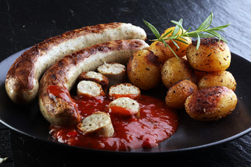 grilled sausages and potatoes