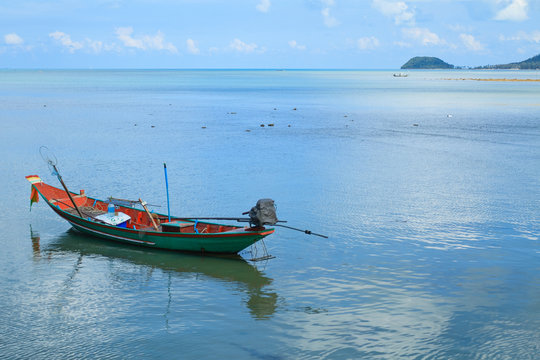 Long tail boat floating on the sea