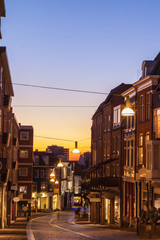 Windows shopping in Nijmegen squre city center at dusk twilight, the netherlands
