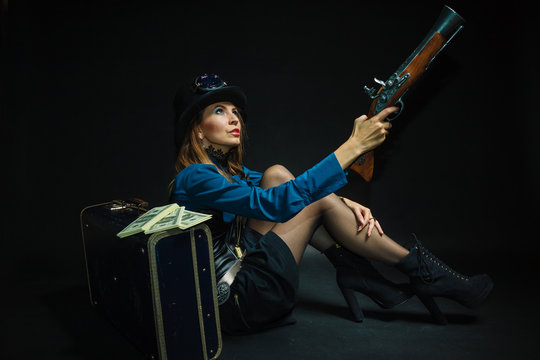Steampunk girl armed and dangerous.