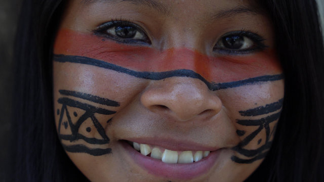 Closeup face of Native Brazilian Woman at an indigenous tribe in the Amazon