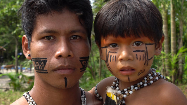 Father and Son at an indigenous tribe in the Amazon