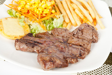 Grilled Meat with French Fries and Salad