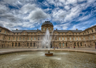 Fototapeta na wymiar Louvre Palace at Paris in summer