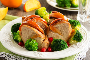 Pork baked with persimmons.