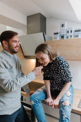 Fototapeta premium Young woman stealing a bite of chocolate