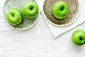 ripe green apples white table background top view space for text
