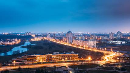 Fototapeta na wymiar Minsk, Belarus. Aerial Cityscape In Bright Blue Hour Evening And