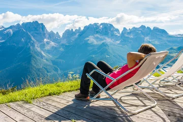 Gordijnen Young woman enjoying mountain view. © anzebizjan
