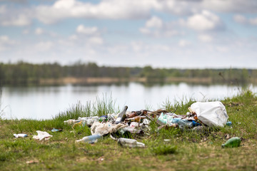 Garbage dump on the lake nature environment problems